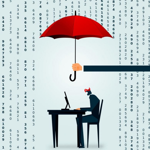 Umbrella shields person at desk with computer from a rain made of numbers.