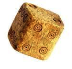 Ancient dice, yellowed and pockmarked